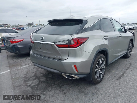 2018 Lexus RX 350 with VIN 2T2ZZMCA2JC098105, listed as a IAAI auction lot 42200869 with 52,323 mi miles and . Bid and sale history available at DreamBid. Image 4.