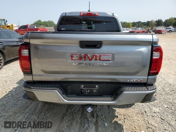 2024 GMC Canyon 4WD AT4 with VIN 1GTP6DEK9R1116173, listed as a Copart auction lot 71005134 with 5,298 mi miles and Salvage Title. Bid and sale history available at carsss.com. Image 6.