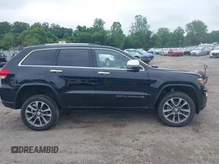 2018 Jeep Grand Cherokee High Altitude with VIN 1C4RJFCG0JC314389, listed as a IAAI auction lot 42512327 with 38,033 mi miles and . Bid and sale history available at DreamBid. Image 14.