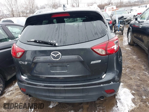 2014 Mazda CX-5 Touring with VIN JM3KE2CY2E0407453, listed as a IAAI auction lot 41564916 with 104,852 mi miles. Bid and sale history available at carsss.com. Image 15.