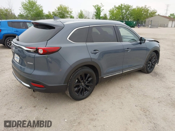 2023 Mazda CX-9 Grand Touring with VIN JM3TCBDY2P0636226, listed as a IAAI auction lot 42384360 with 161,352 mi miles and . Bid and sale history available at DreamBid. Image 4.