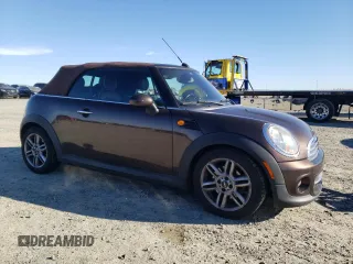 2012 MINI Convertible with VIN WMWZN3C55CT133967, listed as a Copart auction lot 88546705 with 104,357 mi miles and Non repairable. Bid and sale history available at DreamBid. Image 4.