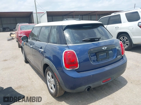 2017 MINI Hardtop 4 Door Cooper with VIN WMWXU1C59H2E18069, listed as a IAAI auction lot 42286035 with 85,835 mi miles and . Bid and sale history available at DreamBid. Image 3.