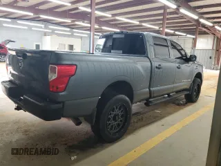 2016 Nissan Titan SV with VIN 1N6BA1F11GN517457, listed as a Copart auction lot 60994175 with 102,321 mi miles and Clean title. Bid and sale history available at DreamBid. Image 3.