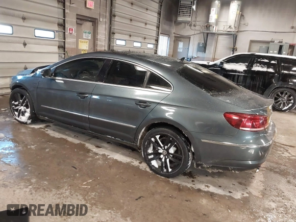 2013 Volkswagen CC Lux with VIN WVWRP7AN5DE540510, listed as a IAAI auction lot 41571739 with 129,295 mi miles. Bid and sale history available at carsss.com. Image 3.