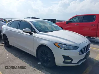 2020 Ford Fusion SE z VIN 3FA6P0HD3LR161093, wystawiony jako IAAI lot #42127161 z przebiegiem 59 607 mil mil oraz . Historia ofert i sprzedaży dostępna na DreamBid. Obrazek 1.