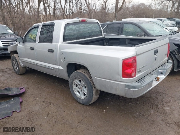 2005 Dodge Dakota Laramie with VIN 1D7HE58N05S244878, listed as a IAAI auction lot 41662513 with 171,323 mi miles. Bid and sale history available at carsss.com. Image 3.