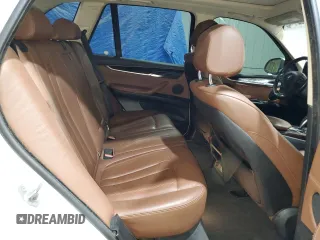 2014 BMW X5 xDrive35i z VIN 5UXKR0C5XE0K43083, wystawiony jako Copart lot #59182445 z przebiegiem 163 171 mil mil oraz Szkoda całkowita • Salvage title. Historia ofert i sprzedaży dostępna na DreamBid. Obrazek 11.