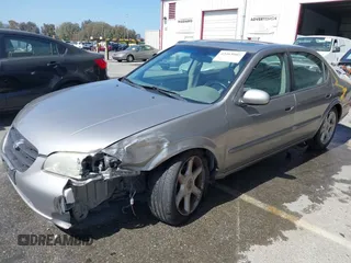 2001 Nissan Maxima GXE with VIN JN1CA31D41T815592, listed as a IAAI auction lot 42465005 with 96,822 mi miles and . Bid and sale history available at DreamBid. Image 2.