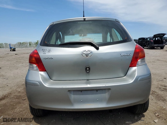 2009 Toyota Yaris with VIN JTDJT903095261798, listed as a Copart auction lot 54152805 with 138,246 mi miles and Clean Title. Bid and sale history available at carsss.com. Image 6.