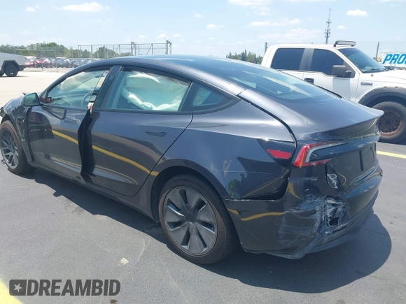 2025 Tesla Model 3 Long Range with VIN 5YJ3E1EA0SF903825, listed as a IAAI auction lot 42197820 with 4,944 mi miles and . Bid and sale history available at DreamBid. Image 3.