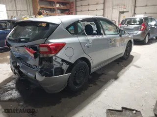 2019 Subaru Impreza with VIN 4S3GTAA6XK3751073, listed as a IAAI auction lot 41727552 with 131,982 mi miles. Bid and sale history available at carsss.com. Image 4.