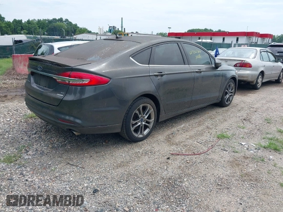 2017 Ford Fusion SE with VIN 3FA6P0HD1HR203168, listed as a IAAI auction lot 42786766 with 124,763 mi miles and . Bid and sale history available at DreamBid. Image 4.