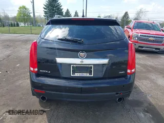 2014 Cadillac SRX Luxury Collection z VIN 3GYFNEE32ES659705, wystawiony jako IAAI lot #42148269 z przebiegiem 140 560 mil mil oraz . Historia ofert i sprzedaży dostępna na DreamBid. Obrazek 16.