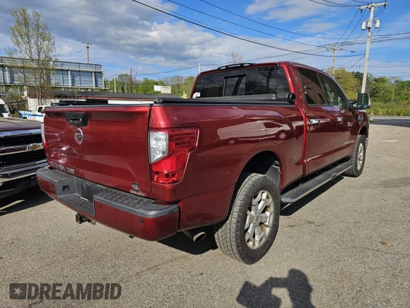 2016 Nissan Titan SL with VIN 1N6BA1F46GN512782, listed as a Copart auction lot 56707315 with 123,503 mi miles and Clean title. Bid and sale history available at DreamBid. Image 4.