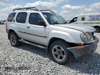 2004 Nissan Xterra XE z VIN 5N1ED28T04C659829, wystawiony jako Copart lot #57633085 z przebiegiem 180 057 mil mil oraz Szkody całkowita. Historia ofert i sprzedaży dostępna na DreamBid. Obrazek 4.