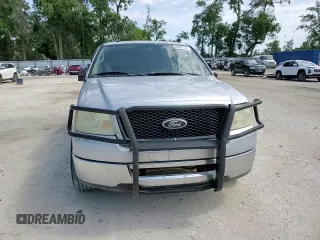 2006 Ford F-150 XLT with VIN 1FTRW12W06KD84579, listed as a Copart auction lot 55090155 with 296,917 mi miles and Salvage Title. Bid and sale history available at DreamBid. Image 14.
