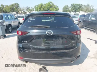 2020 Mazda CX-5 Touring with VIN JM3KFACM2L0770241, listed as a IAAI auction lot 42186952 with 41,590 mi miles and . Bid and sale history available at DreamBid. Image 17.