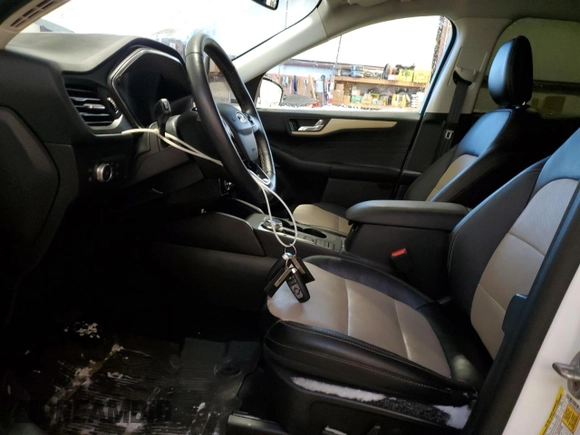 2021 Ford Escape Titanium Hybrid с VIN 1FMCU9DZ6MUA53908, выставлен на аукционе Copart как лот 85946674 с пробегом 31 476 миль миль и Списание • Salvage title. История ставок и продаж доступна на DreamBid. Изображение 7.