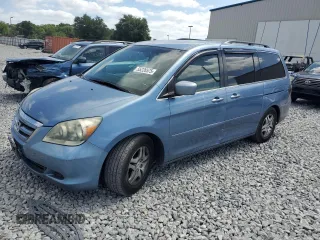 2007 Honda Odyssey EX with VIN 5FNRL38457B052131, listed as a Copart auction lot 55226575 with 165,745 mi miles and Salvage Title. Bid and sale history available at DreamBid. Image 1.