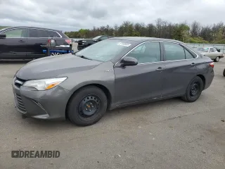 2015 Toyota Camry LE z VIN 4T1BD1FK9FU156918, wystawiony jako Copart lot #57908665 z przebiegiem 105 156 mil mil oraz Czysty tytuł • Clean title. Historia ofert i sprzedaży dostępna na DreamBid. Obrazek 1.