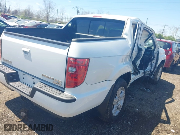 2009 Honda Ridgeline RTL with VIN 5FPYK16529B107871, listed as a IAAI auction lot 42049833 with 141,214 mi miles. Bid and sale history available at carsss.com. Image 4.