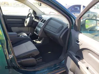 2009 Dodge Journey SXT with VIN 3D4GG57V09T170094, listed as a IAAI auction lot 41867577 with 122,831 mi miles. Bid and sale history available at carsss.com. Image 5.