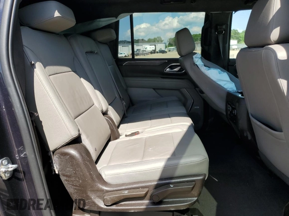 2022 Chevrolet Suburban LT z VIN 1GNSKCKT1NR288858, wystawiony jako Copart lot #56998095 z przebiegiem 96 859 mil mil oraz Szkoda całkowita • Salvage title. Historia ofert i sprzedaży dostępna na DreamBid. Obrazek 11.