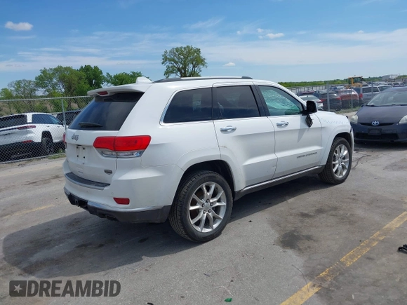 2014 Jeep Grand Cherokee Summit with VIN 1C4RJFJG0EC174871, listed as a IAAI auction lot 42341312 with 170,743 mi miles and . Bid and sale history available at DreamBid. Image 4.