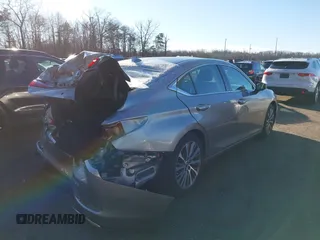 2020 Lexus ES with VIN 58ADZ1B13LU073464, listed as a IAAI auction lot 41195303 with 57,991 mi miles. Bid and sale history available at carsss.com. Image 4.