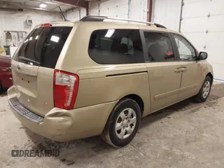 2009 Kia Sedona LX with VIN KNDMB233996314804, listed as a IAAI auction lot 42014187 with 220,693 mi miles and . Bid and sale history available at DreamBid. Image 4.