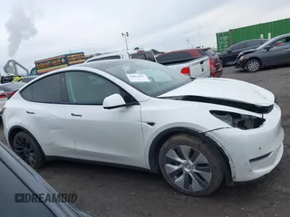 2022 Tesla Model Y Long Range z VIN 7SAYGDEE7NF389788, wystawiony jako IAAI lot #42014111 z przebiegiem 37 606 mil mil oraz . Historia ofert i sprzedaży dostępna na DreamBid. Obrazek 12.