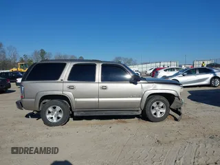 2003 Chevrolet Tahoe LS with VIN 1GNEK13Z03J294201, listed as a IAAI auction lot 41656836 with 302,922 mi miles. Bid and sale history available at carsss.com. Image 13.