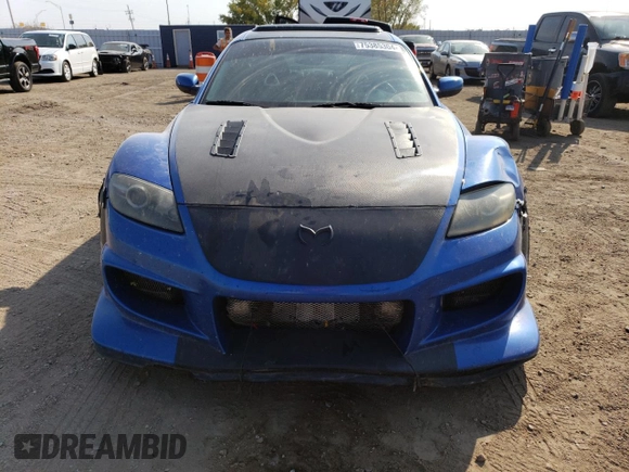 2004 Mazda RX-8 with VIN JM1FE173440114865, listed as a Copart auction lot 75385304 with 67,943 mi miles and Clean Title. Bid and sale history available at DreamBid. Image 5.