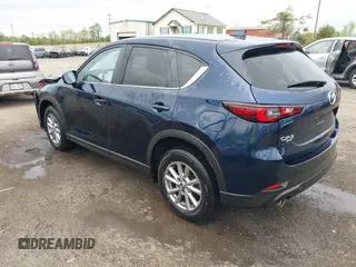 2023 Mazda CX-5 S Select with VIN JM3KFBBM5P0254047, listed as a IAAI auction lot 42069916 with 29,600 mi miles and . Bid and sale history available at carsss.com. Image 3.
