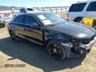 2015 Audi A3 Premium z VIN WAUACGFF5F1121056, wystawiony jako IAAI lot #42370603 z przebiegiem 135 692 mil mil oraz . Historia ofert i sprzedaży dostępna na DreamBid. Obrazek 1.