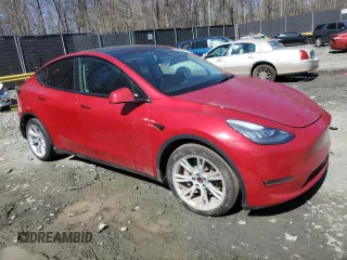 2021 Tesla Model Y Long Range with VIN 5YJYGAEE4MF260627, listed as a Copart auction lot 49091655 with 67,850 mi miles and Salvage Title. Bid and sale history available at DreamBid. Image 4.