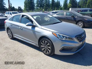 2015 Hyundai Sonata Sport with VIN 5NPE34AF2FH100233, listed as a IAAI auction lot 42465894 with 70,148 mi miles and . Bid and sale history available at DreamBid. Image 1.
