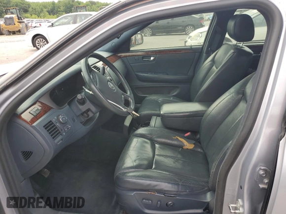 2006 Cadillac DTS 1SC z VIN 1G6KD57Y36U186630, wystawiony jako Copart lot #60792235 z przebiegiem 137 670 mil mil oraz Czysty tytuł • Clean title. Historia ofert i sprzedaży dostępna na DreamBid. Obrazek 7.