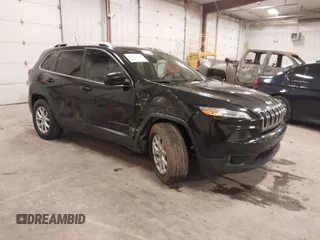2014 Jeep Cherokee Latitude with VIN 1C4PJLCB3EW154989, listed as a IAAI auction lot 41722235 with 140,012 mi miles. Bid and sale history available at carsss.com. Image 1.