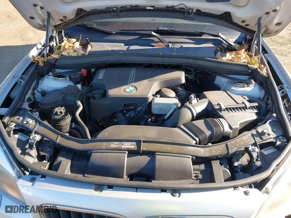 2013 BMW X1 xDrive28i with VIN WBAVL1C57DVR84747, listed as a IAAI auction lot 41273794 with 93,738 mi miles. Bid and sale history available at carsss.com. Image 10.
