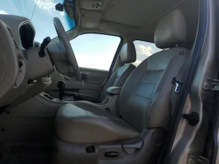 2007 Ford Escape Limited with VIN 1FMCU04177KA09776, listed as a Copart auction lot 60784535 with 175,679 mi miles and Salvage title. Bid and sale history available at DreamBid. Image 7.