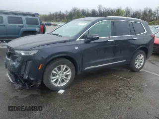 2021 Cadillac XT6 AWD Luxury z VIN 1GYKPBR4XMZ215970, wystawiony jako Copart lot #56762225 z przebiegiem 47 800 mil mil oraz Szkoda całkowita • Salvage title. Historia ofert i sprzedaży dostępna na DreamBid. Obrazek 1.