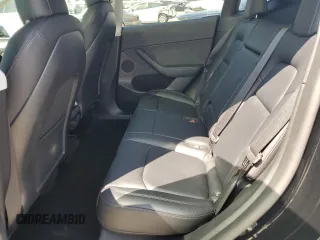 2022 Tesla Model Y Performance with VIN 7SAYGDEF6NF524171, listed as a Copart auction lot 60736945 with 30,629 mi miles and Salvage title. Bid and sale history available at DreamBid. Image 10.