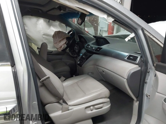 2011 Honda Odyssey EX-L with VIN 5FNRL5H62BB083682, listed as a IAAI auction lot 41425267 with 169,166 mi miles and . Bid and sale history available at carsss.com. Image 5.