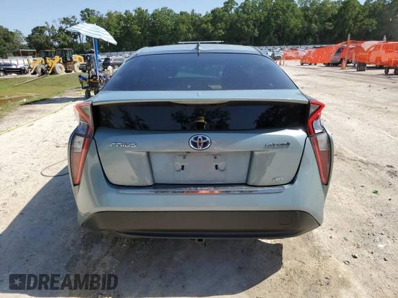 2016 Toyota Prius Four z VIN JTDKARFU4G3503320, wystawiony jako Copart lot #56989525 z przebiegiem 139 551 mil mil oraz Szkoda całkowita • Salvage title. Historia ofert i sprzedaży dostępna na DreamBid. Obrazek 6.
