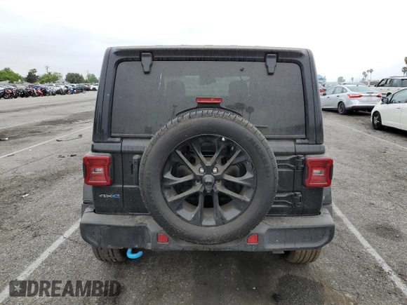 2024 Jeep Wrangler Sahara with VIN 1C4RJXP6XRW168603, listed as a Copart auction lot 59056565 with 5,625 mi miles and Non repairable. Bid and sale history available at DreamBid. Image 6.