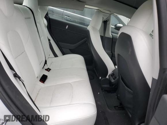 2023 Tesla Model 3 with VIN 5YJ3E1EAXPF600008, listed as a Copart auction lot 51868055 with 58,733 mi miles and Salvage title. Bid and sale history available at DreamBid. Image 10.