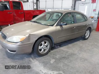 2006 Ford Taurus SE with VIN 1FAFP53U46A123827, listed as a IAAI auction lot 42042946 with 146,393 mi miles. Bid and sale history available at carsss.com. Image 2.