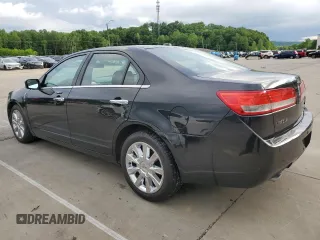 2012 Lincoln MKZ with VIN 3LNHL2JC3CR828543, listed as a Copart auction lot 56451355 with 127,865 mi miles and Salvage title. Bid and sale history available at DreamBid. Image 2.